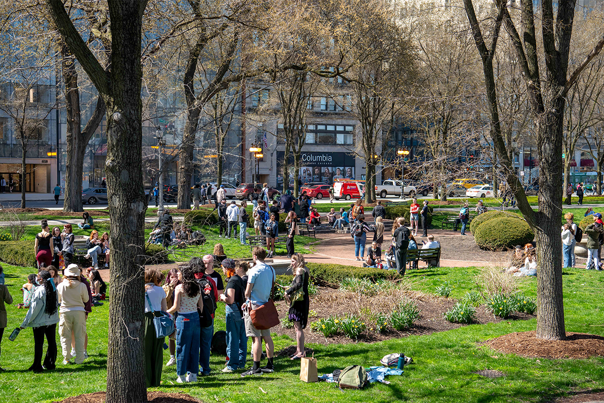 students gather in grant park near columbia college chicago