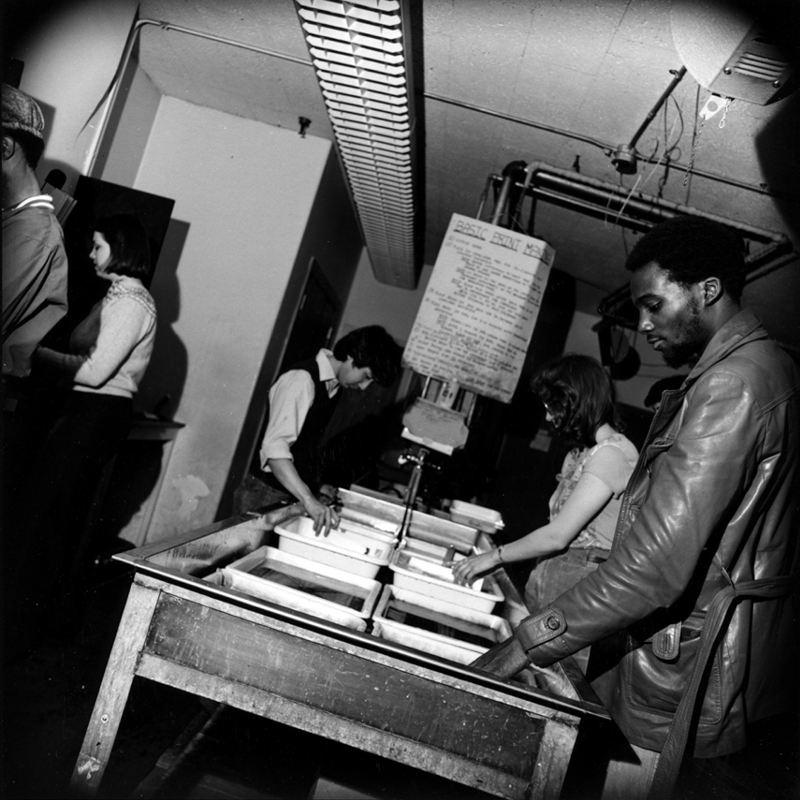 students working in darkroom