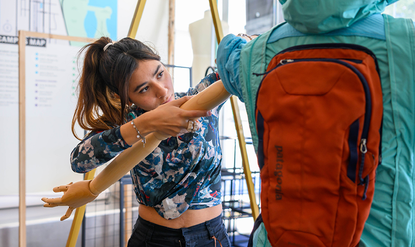 Student working on sewing project