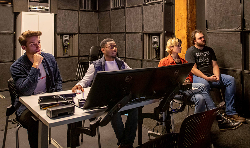 Students in the Audio Arts Degree Program work on equipment