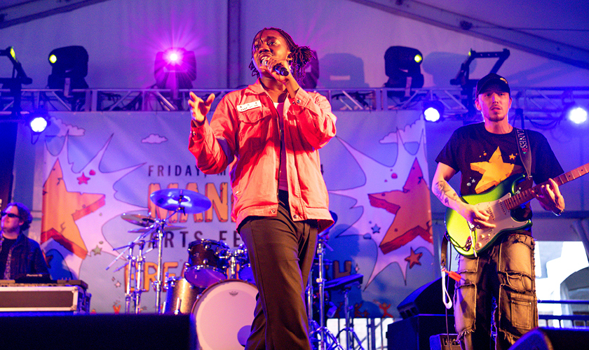 A musical performance student performs on stage