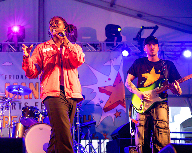 A musical performance student performs on stage