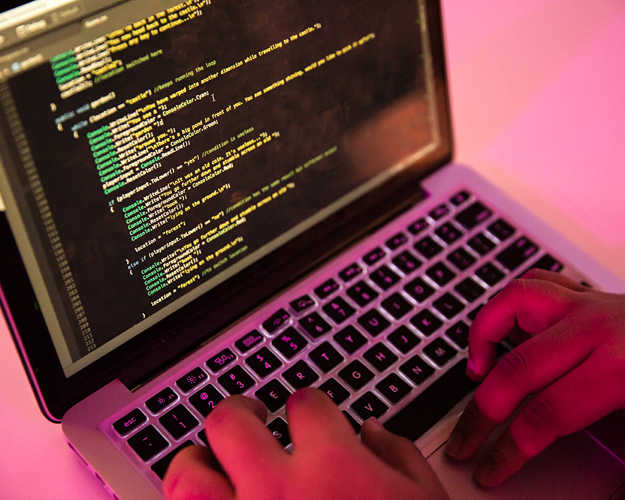 Programming student working at a computer