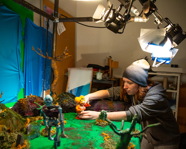 student works on a stop motion animation project