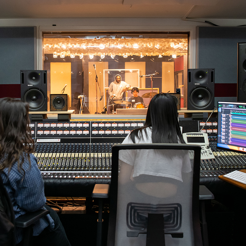 students working in recording studio