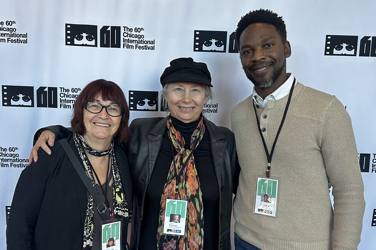 three people in front of chicago international film festival signage