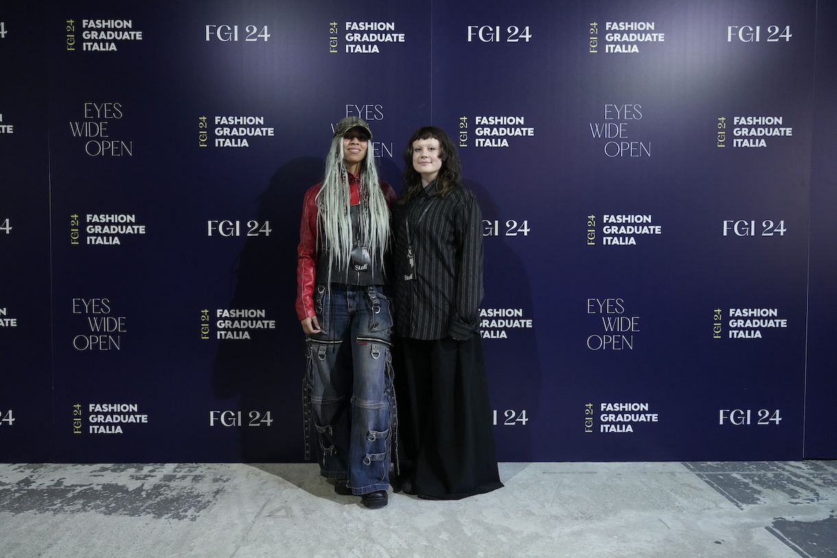 Joelle Helena Olabode and Rae Breazeale pictured backstage at the City to City runway prior to the 2024 Fashion Graduate Italia event in Milan, Italy. Photo by Daniele Schiavello