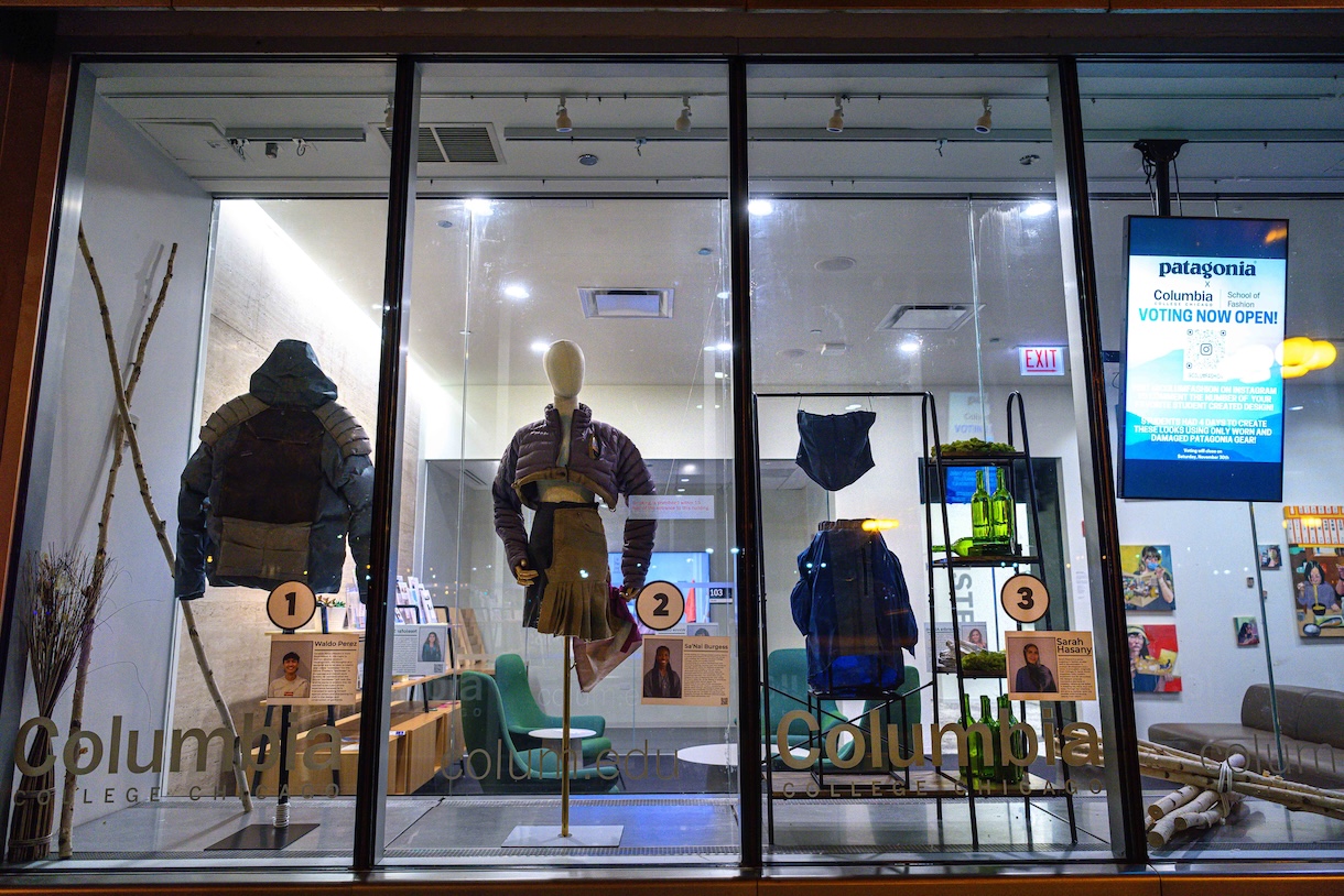 Student designs on display for voting in Columbia's 618 S. Michigan Ave. windows.