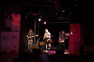 students performing on stage at HAUS space