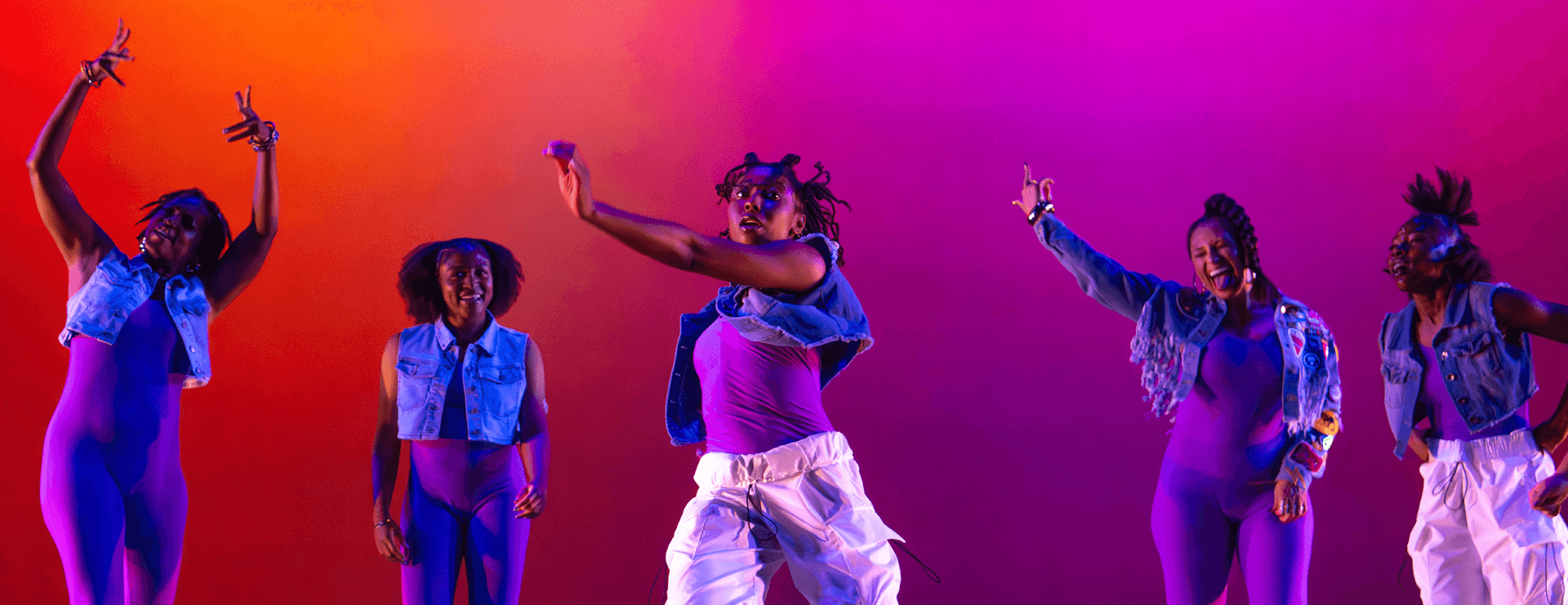 students performing on stage